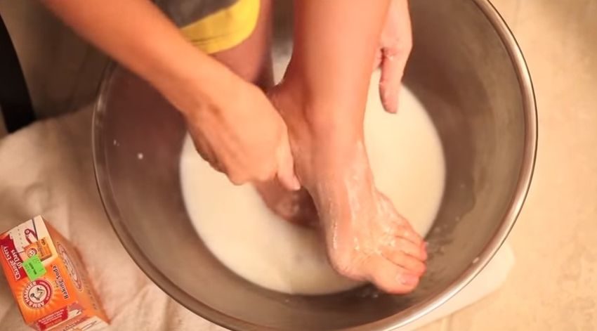 Cleaning her feet